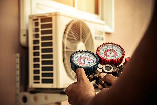 Professional Ac Installation technician working in Plymouth, MI